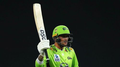 Alex Hales celebrates his 50 against Hobart Hurricanes