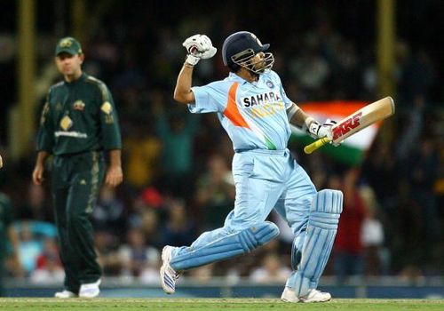 An ecstatic Sachin Tendulkar after reaching his hundred, as Ricky Ponting watches