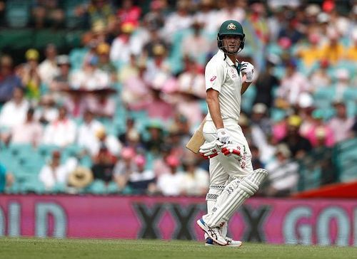 Joe Burns walking back after being dismissed for 18 at the SCG