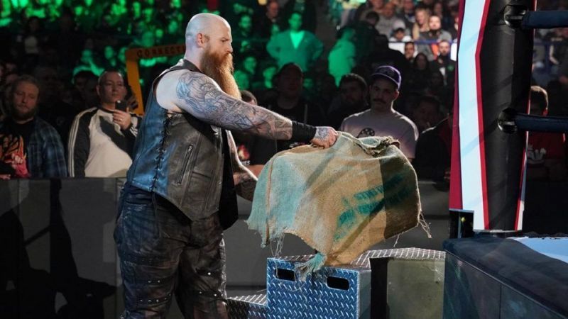 Could Erick Rowan be hiding some kind of animal inside his mysterious cage?