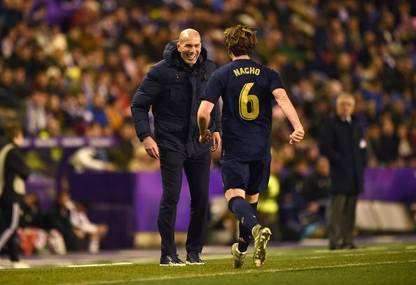 Zinedine Zidane and Nacho celebrate