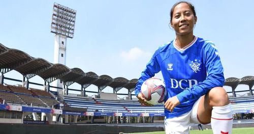 Bala Devi poses at the Kanteerava Stadium following her first press conference as a Rangers player