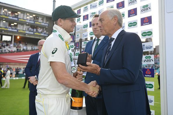 Colin Graves awarding Steve Smith the player of the series award during the 2019 Ashes. Will the Ashes be the same if it was four days?