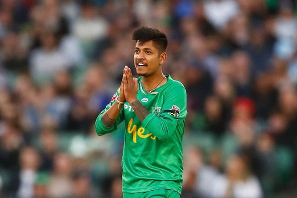 Sandeep Lamichhane in action during BBL match between Melbourne Stars and Melbourne Renegades