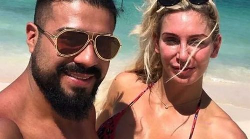 Andrade/Charlotte Flair