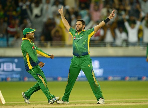 Shahid Afridi celebrates after taking a wicket
