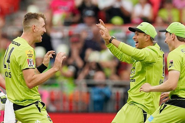 Chris Morris (L) celebrates after executing a wonderful run-out