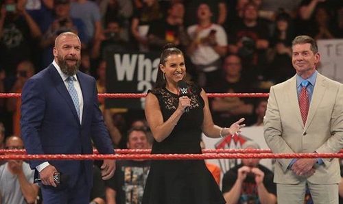 Triple H, Stephanie McMahon, and Vince McMahon