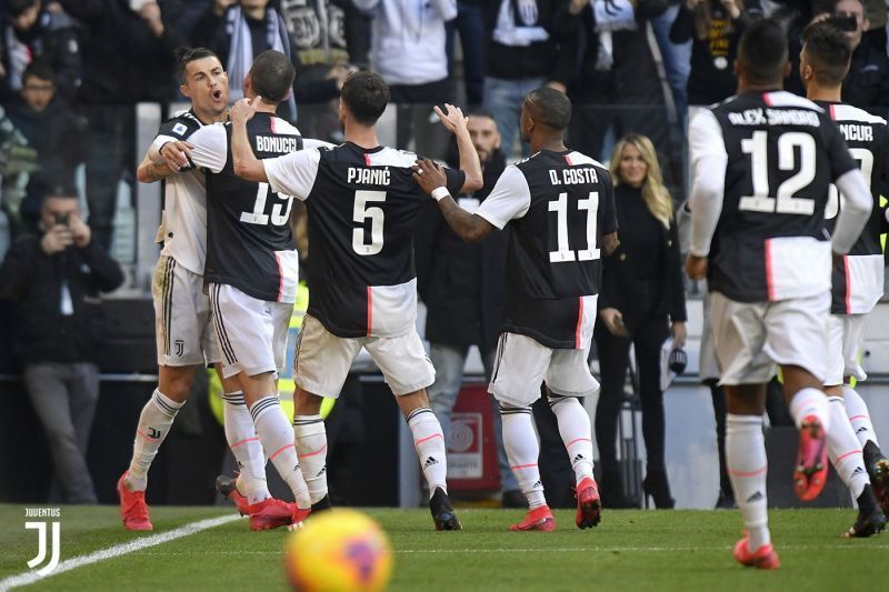 Juventus players celebrate a goal