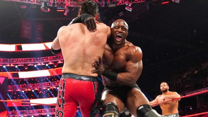Carrillo in action against Lashley while Rusev watches on