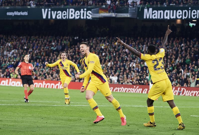 Clement Lenglet wheels away to celebrate his brilliant header - sealing all 3 points for Barcelona at Betis