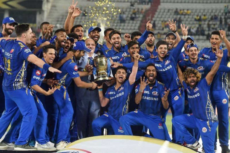 Victorious MI team with the IPL 2019 trophy.