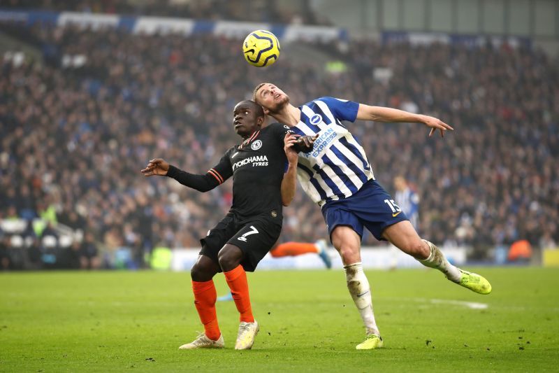 Kante tussling for a header against Brighton and Hove Albion
