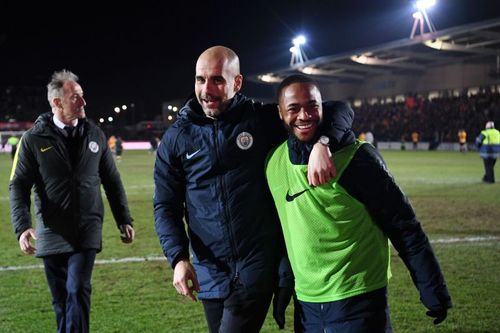 Pep Guardiola and Raheem Sterling