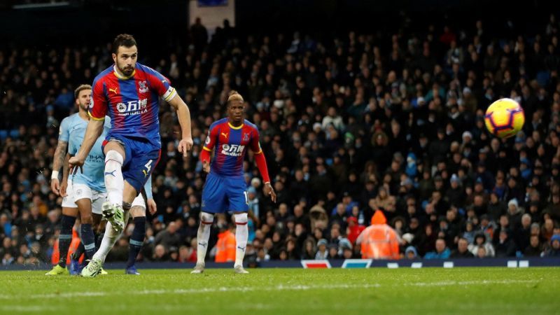 Luka Milivojevic sending the ball into the nets from the spot