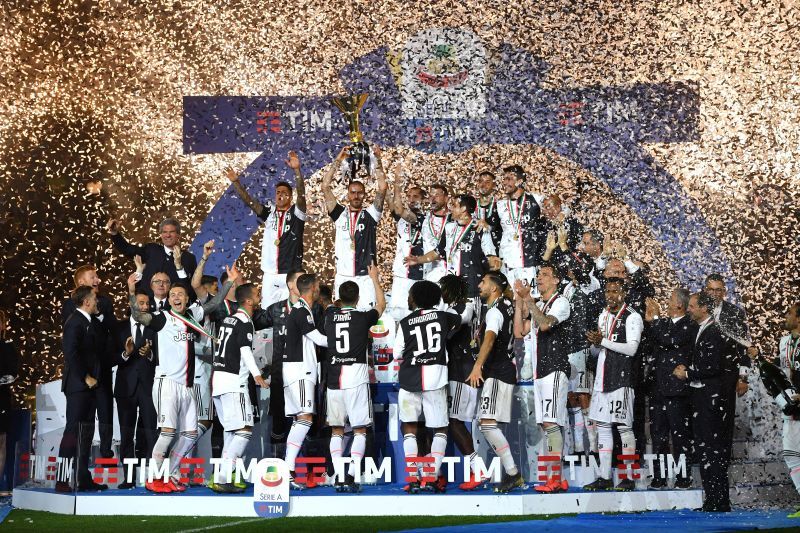 Juventus players celebrating with the 2018-19 Serie A Title