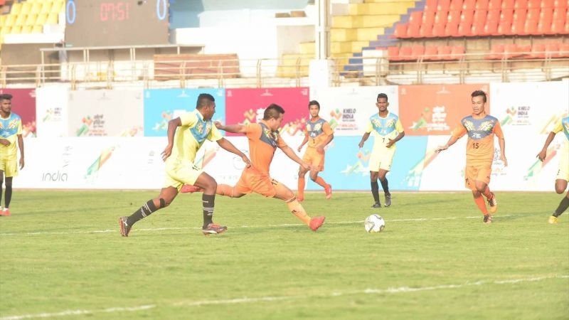 Action from the football competition at the KIYG