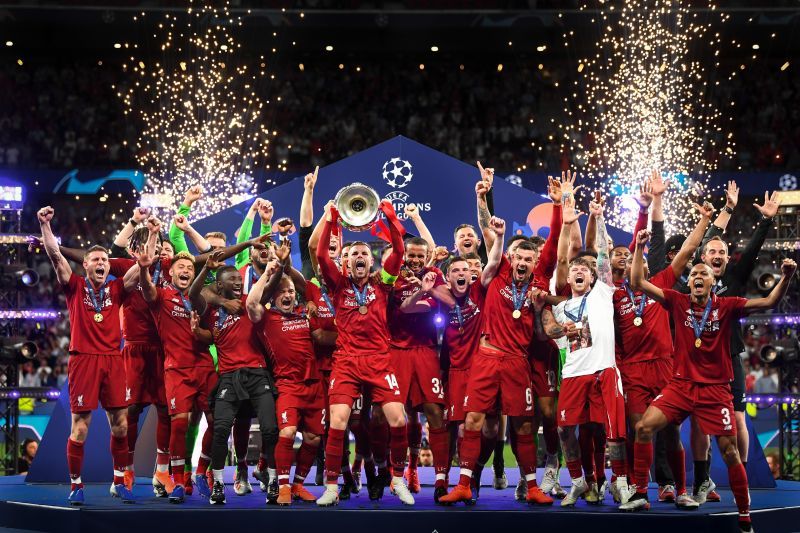 The Liverpool squad with the Champions League trophy they won last season