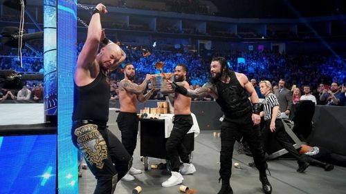 Roman Reigns flinging dog food at King Corbin