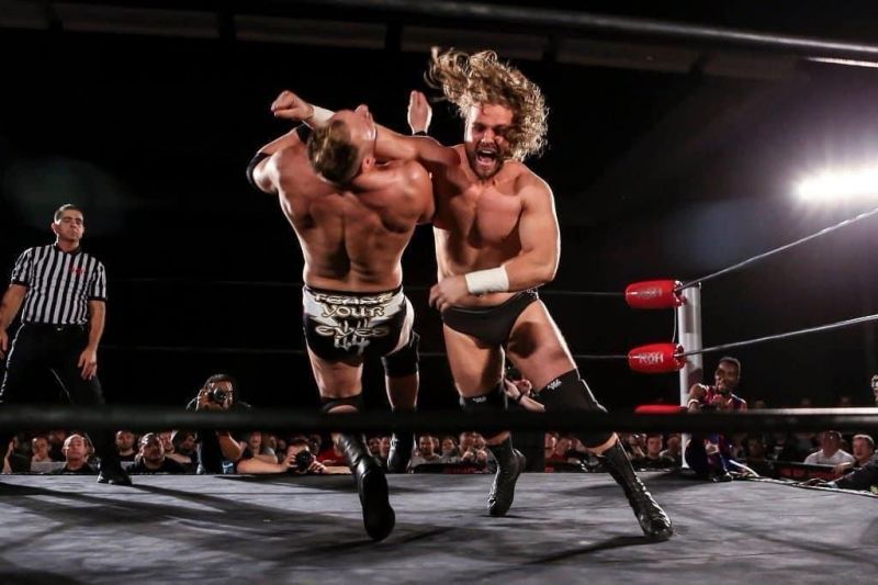 Adam Page&#039;s shotgun lariat takes down an unwary foe.