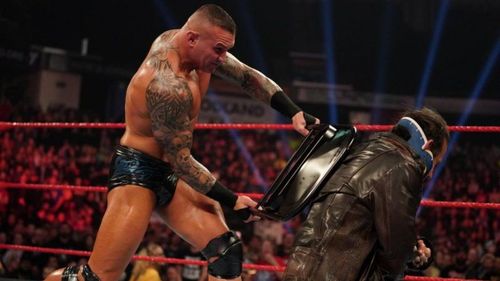 Randy Orton attacking a bruised and battered Matt Hardy on this week's RAW