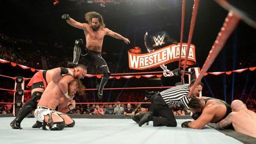 Seth Rollins putting the Stomp on Samoa Joe