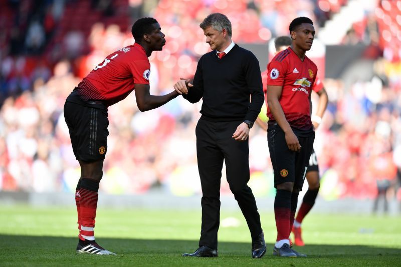 Paul Pogba and Ole Gunnar Solskjaer in the centre, Martial in the right