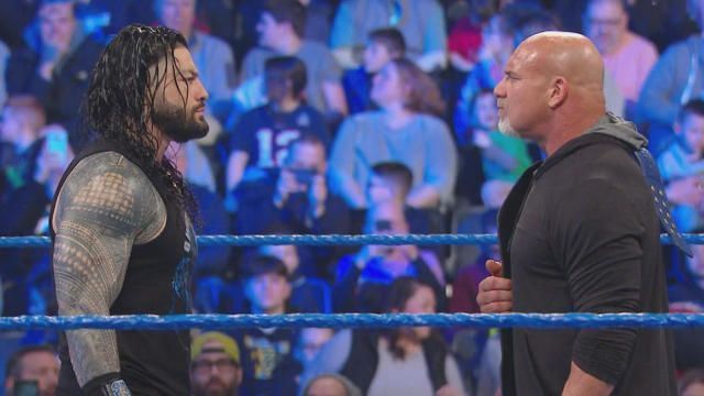 Roman and Goldberg stare each other down on SmackDown.