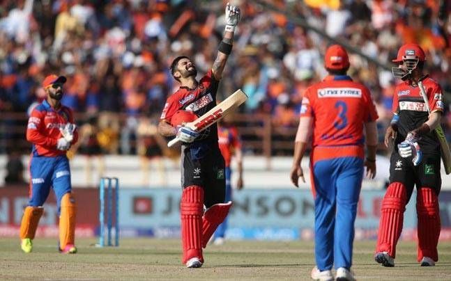 Kohli celebrates scoring his maiden IPL hundred on Sachin Tendulkar's birthday