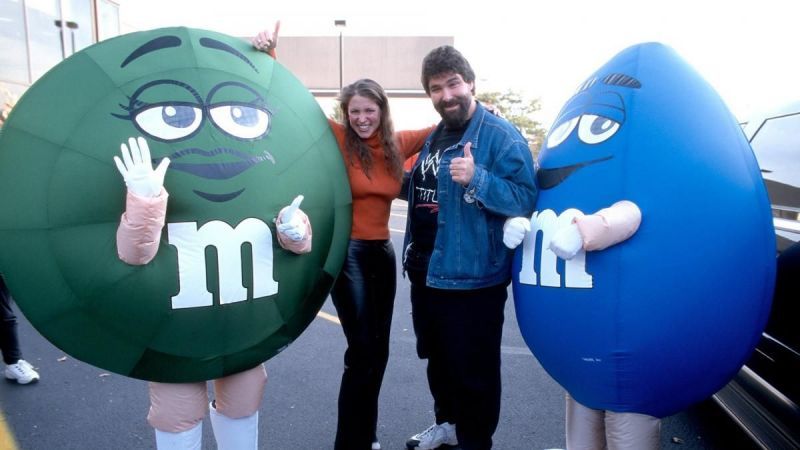 Stephanie McMahon, Mick Foley, and the M&M!