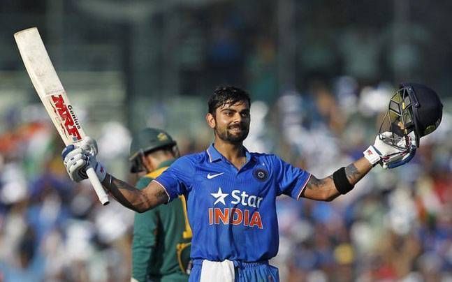 Virat Kohli celebrates after reaching his hundred in Chennai