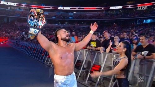 The current US Champion, Andrade, with his business manager Zelina Vega