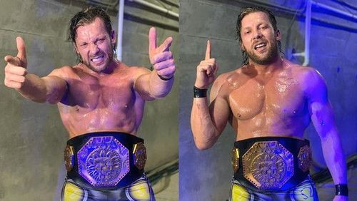 Kenny Omega with the AAA Mega Championship