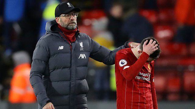 Jurgen Klopp consoling a dejected Andy Robertson