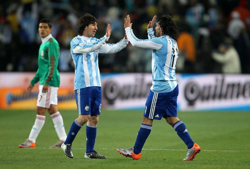 Carlos Tevez (right) scored a fragrantly offside goal for Argentina against Mexico in the 2010 World Cup