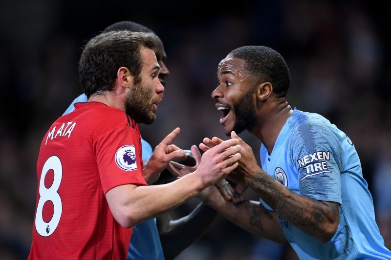 Juan Mata (left) and Raheem Sterling (right) arguing during the December Manchester derby