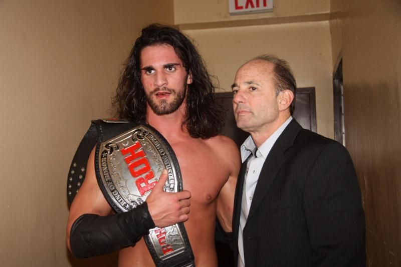 Rollins (as ROH World Champion) with former ROH Owner, Cary Silkin