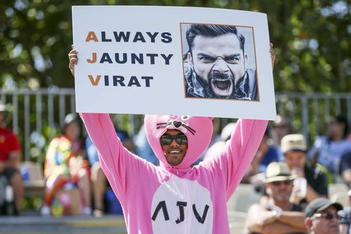 A cricket fan with Virat Kohli's banner in New Zealand