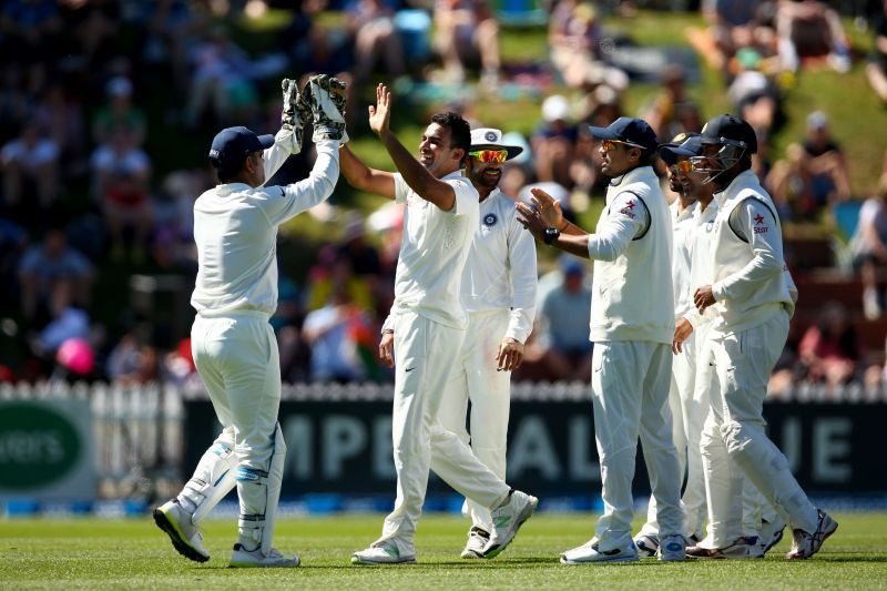 Zaheer Khan celebrates with teammates