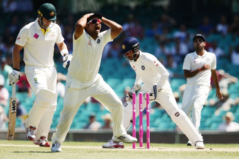 Saha behind the stumps.