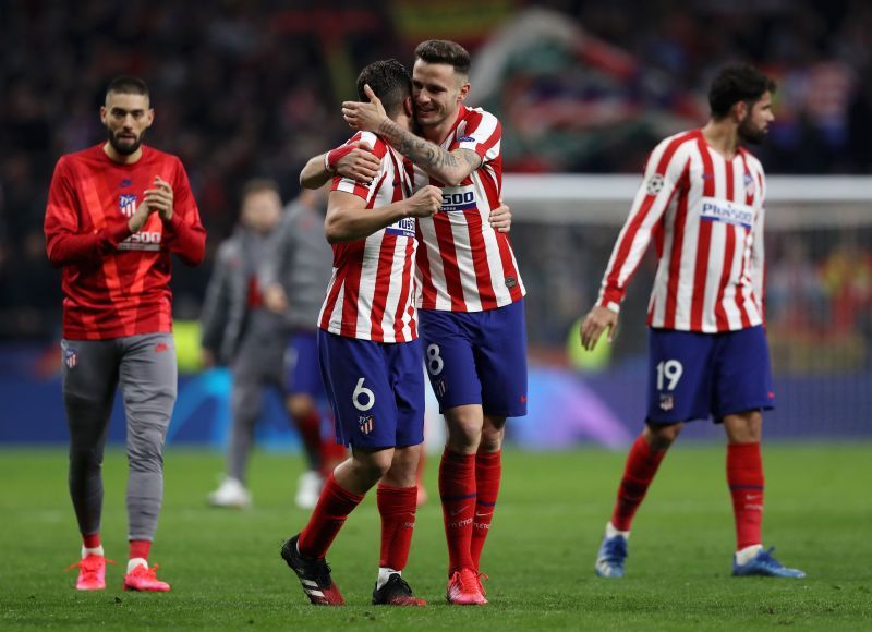Atletico Madrid players celebrate their first leg win against Liverpool.