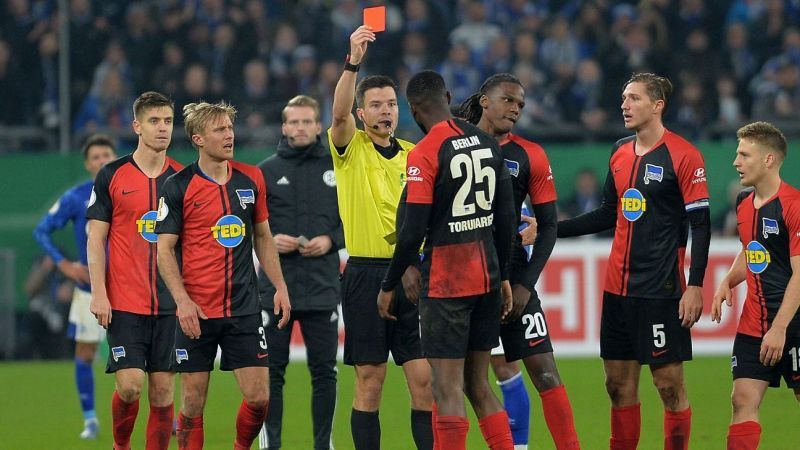 Jordan Torunarigha, receiving a red card following his emotional reaction to racist abuse
