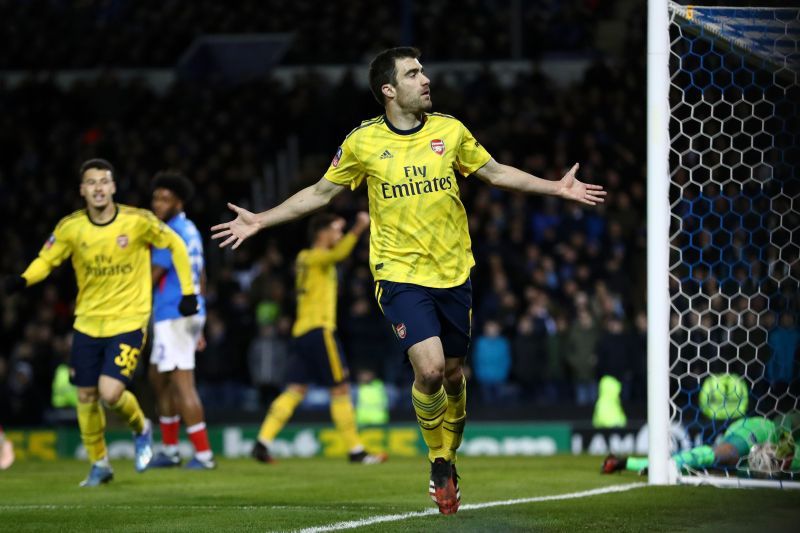 Sokratis Papastathopoulos celebrates his opening goal against Portsmouth