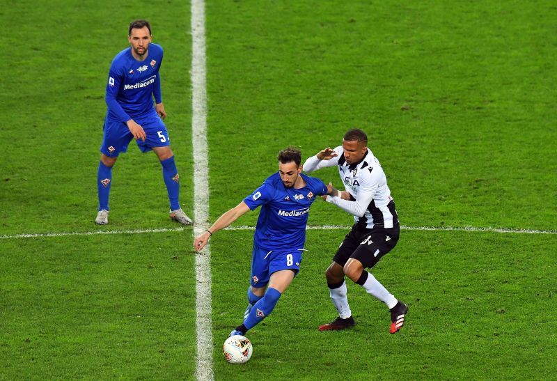 Gaetano Castrovilli competes for the ball with Rodrigo Becao of Udinese Calcio during a Serie A game.