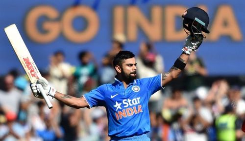 Kohli celebrates after hitting a century.