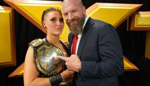 Rhea Ripley with Triple H