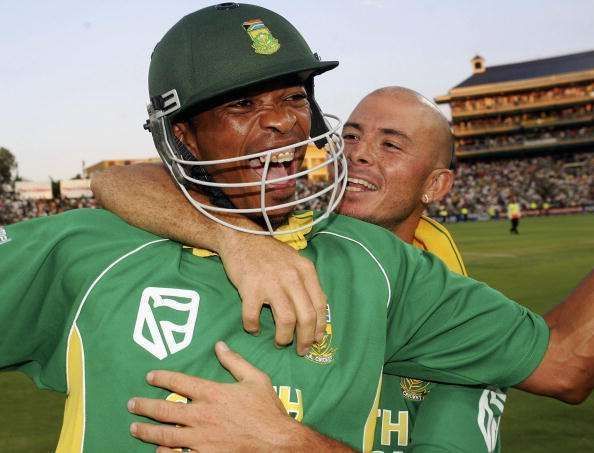 Makhaya Ntini and Herschelle Gibbs