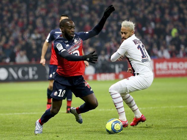 Ikone dribbling past Neymar in Ligue 1 game this season