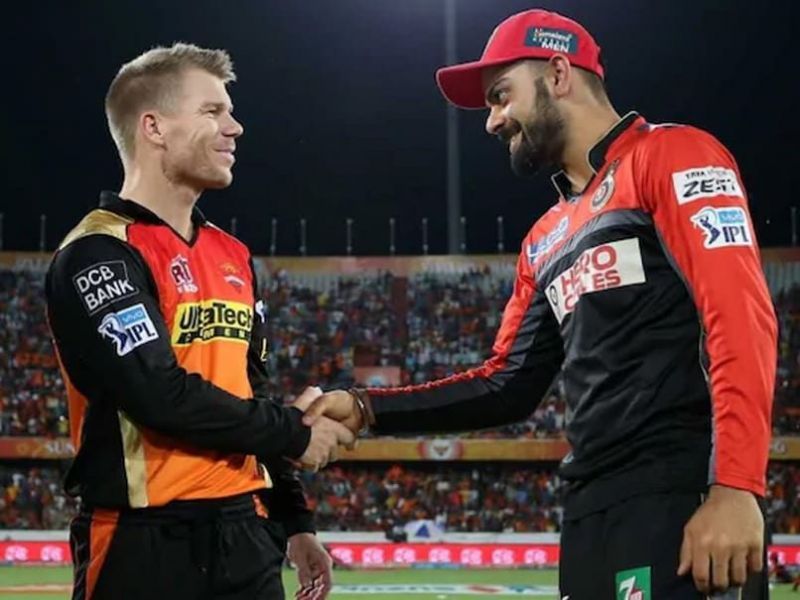 David Warner (L) and Virat Kohli [PC: NDTV]