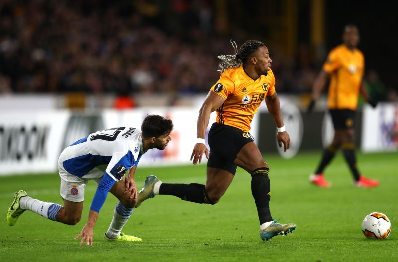 Adama Traore of Wolverhampton Wanderers goes past Diac Vila during a Europe League game.